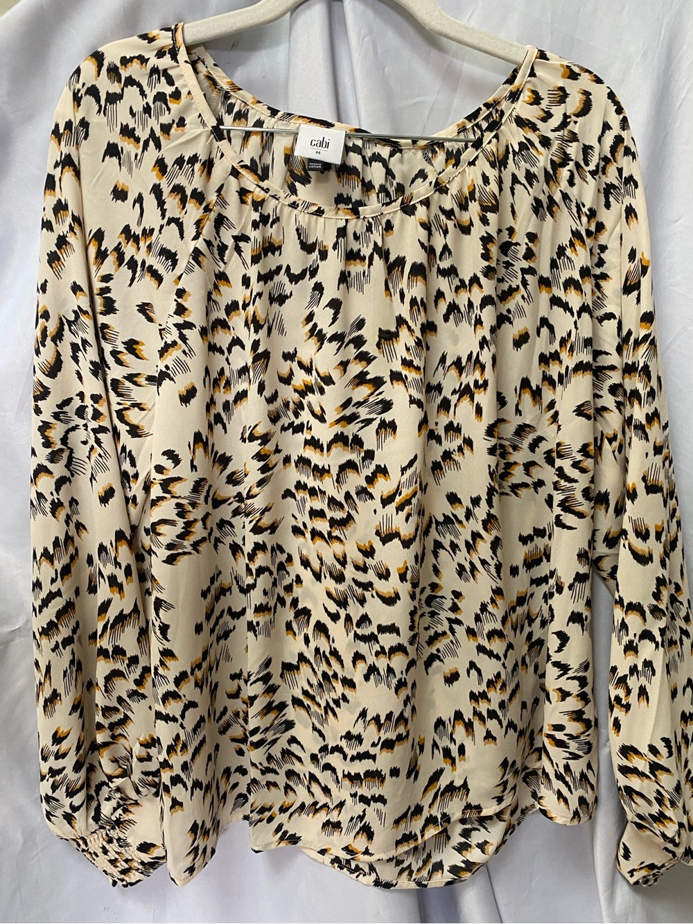 Cabi Round Trip Top. Medium. Black and cream
